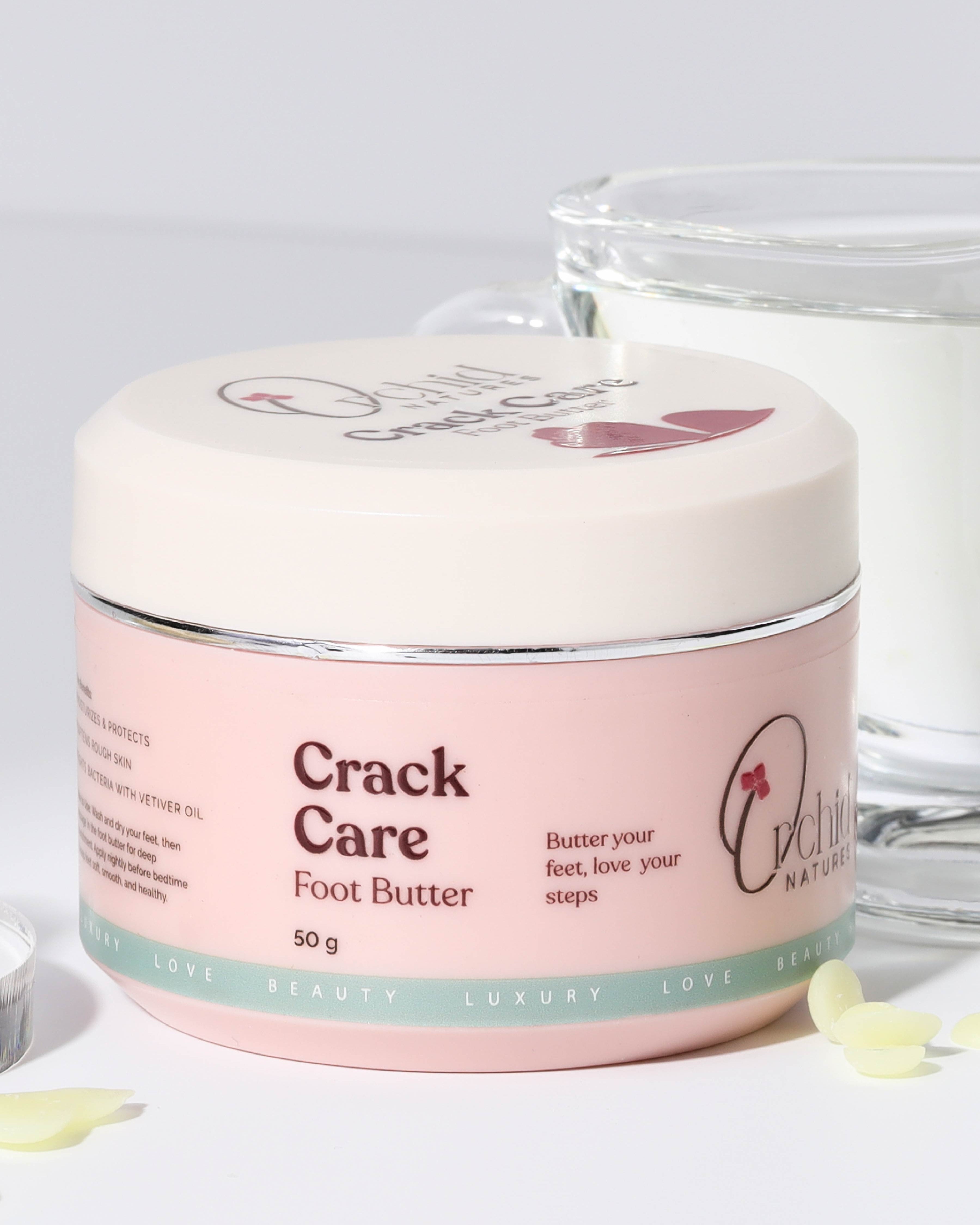 Jar of Crack Care Foot Butter with a white lid on a light gray background