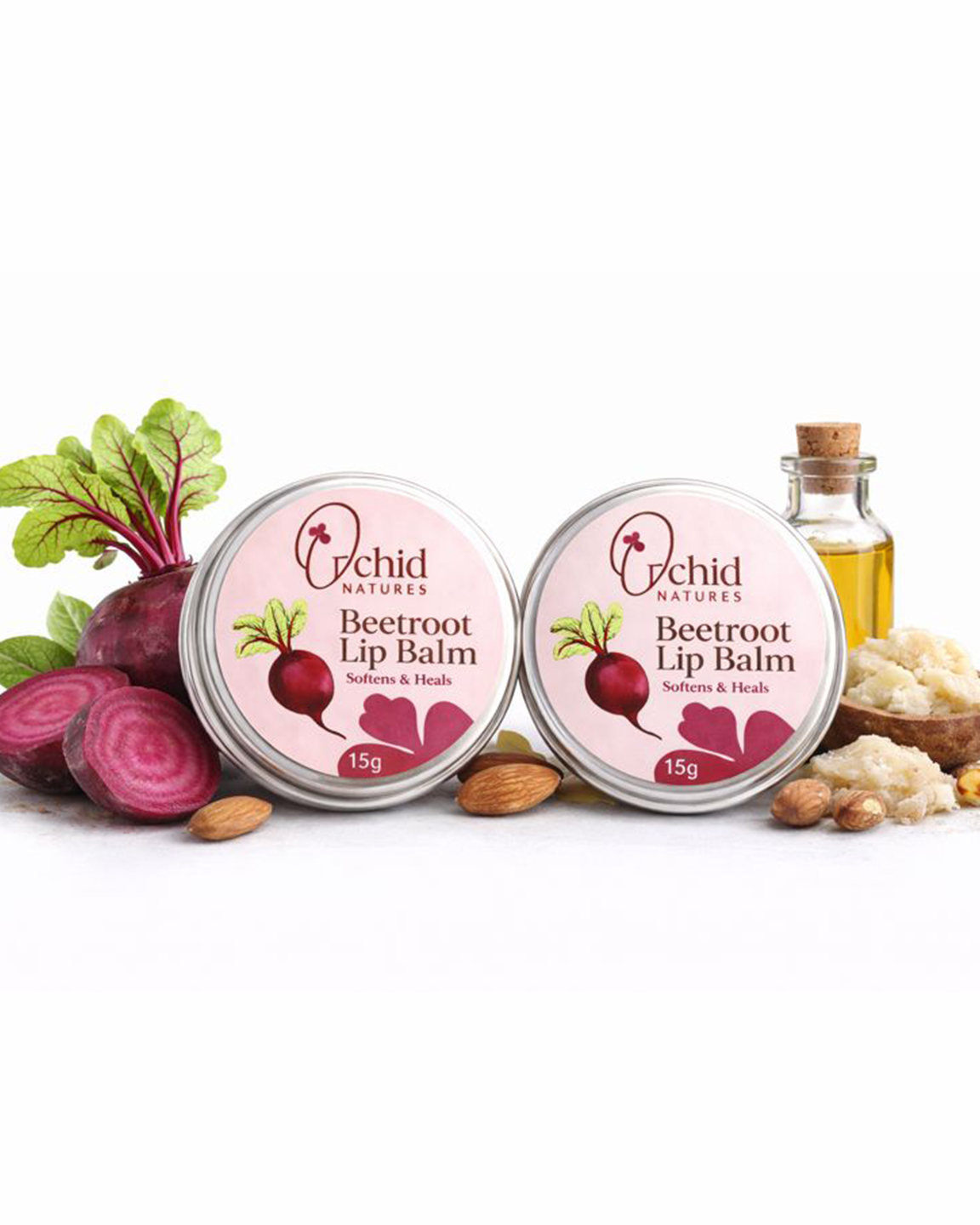 Beetroot lip balm with ingredients on a white background