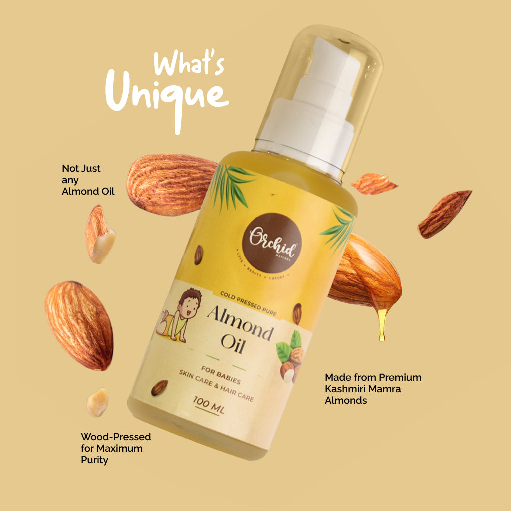 Bottle of Orchid Almond Oil with almonds on a beige background