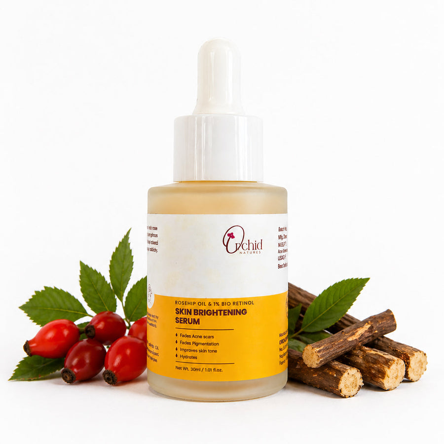 Skincare serum bottle with natural elements on a white background